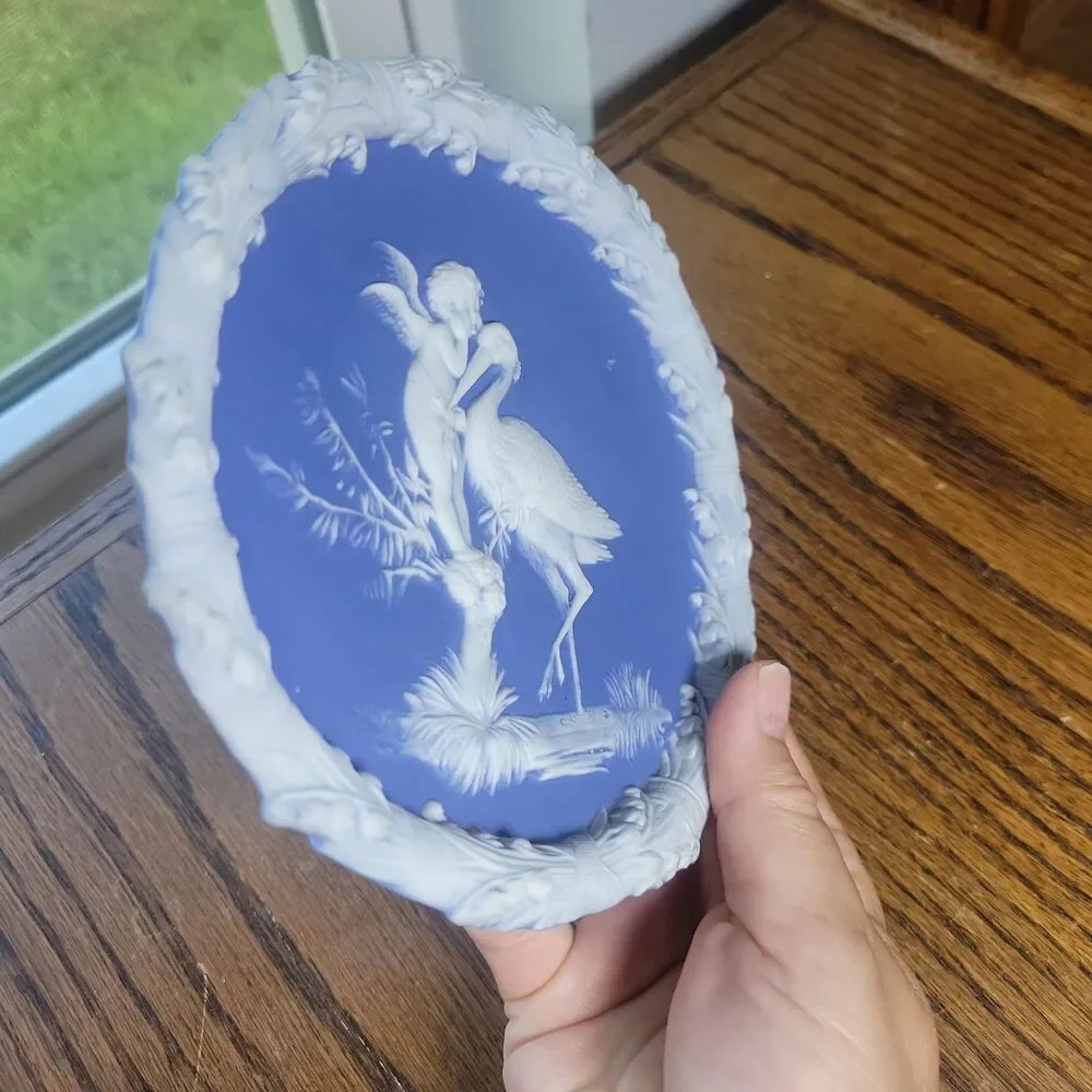 Schafer & Vater Blue & White Jasperware Plaque Featuring a Cherub & Stork Lily
